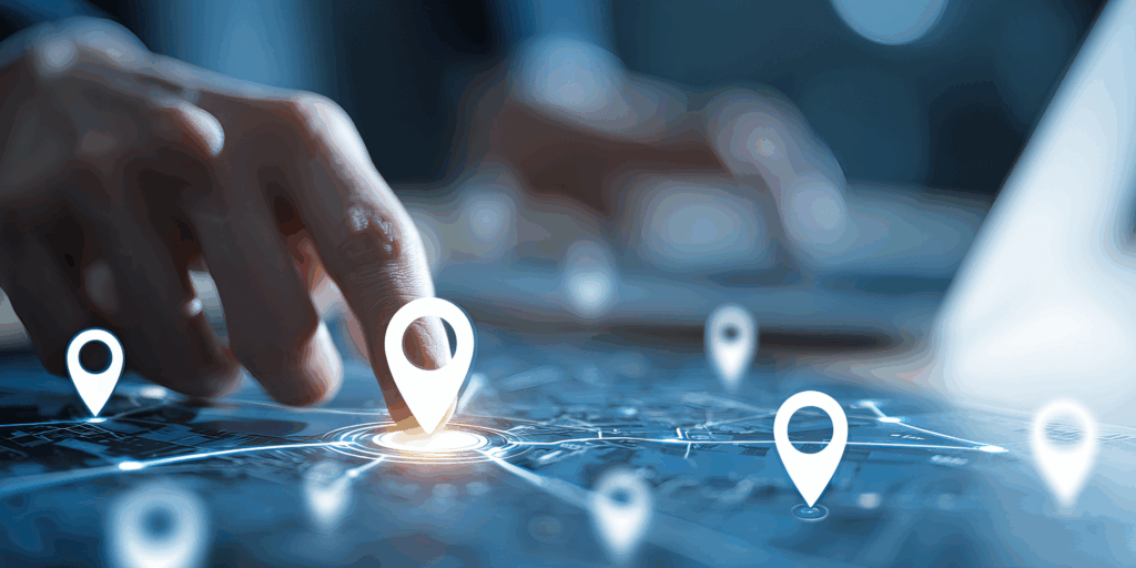 Digital map interface with a hand selecting a glowing location pin, representing local business visibility on Apple Maps.